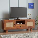 sheesham wood tv unit, tv stand with cane doors, wooden entertainment unit, mid-century tv cabinet, boho style tv stand, handcrafted wooden tv table, solid wood furniture for living room, 54 inch wooden tv stand